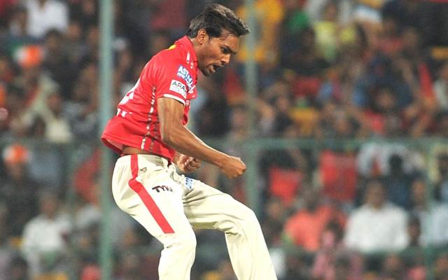 Kings XI Punjab player Sandeep Sharma celebrates fall of Virat Kohli's wicket IPL