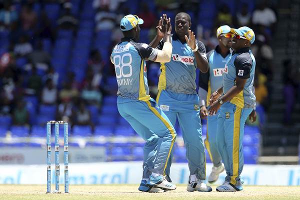 St. Lucia Zouks celebrate a wicket. (Photo by Ashley Allen/LatinContent/Getty Images)